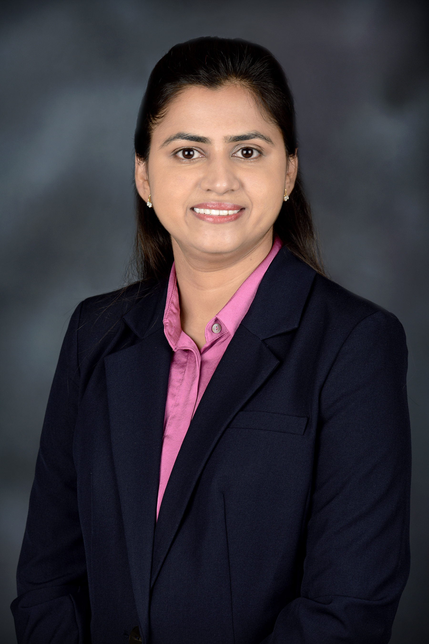 Dr. Neha